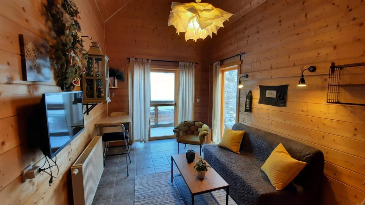 Image 5 of Chaty Świerkowe Wzgórze – domki typu superior z sauną balią kominkiem i domki-bez sauny balii kominka