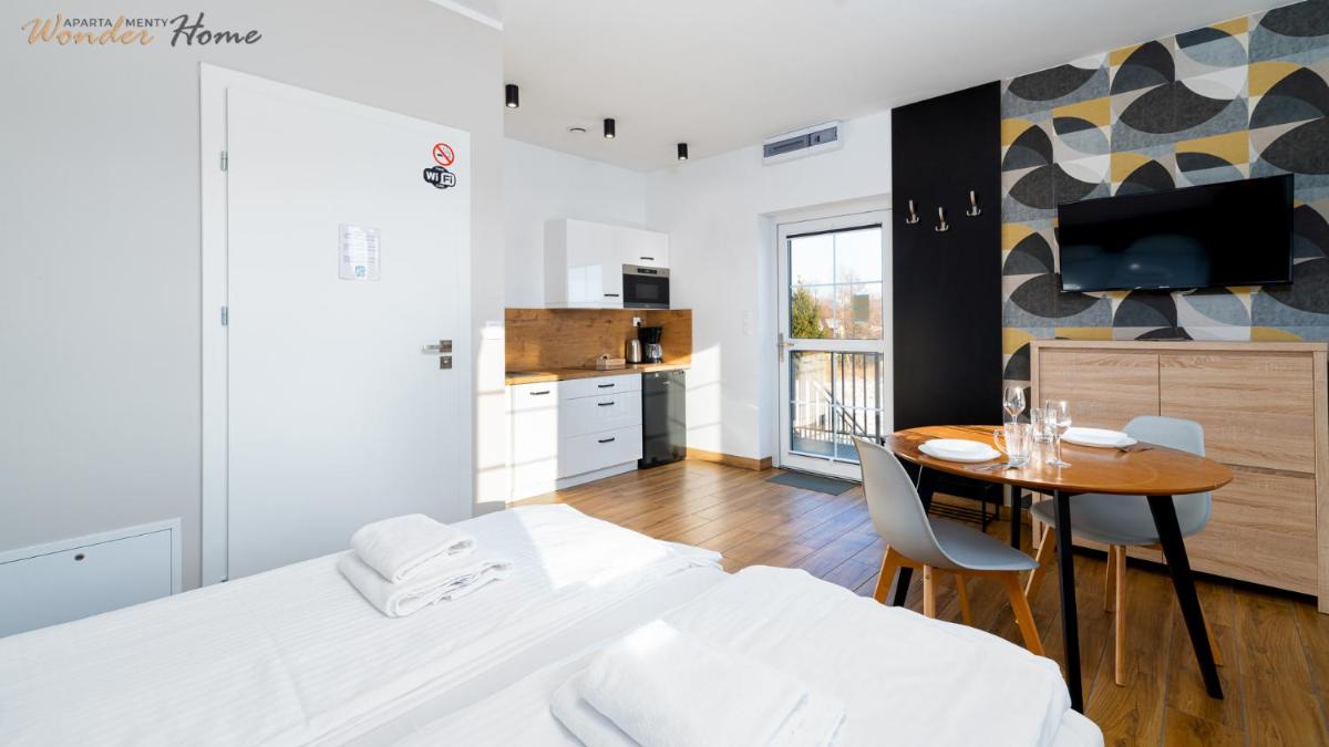 Image 2 of Wonder Home – Apartamenty Halo Karkonosze z ogrodem, sezonowym basenem, placem zabaw i widokiem na Śnieżkę – zlokalizowane blisko Karpacza