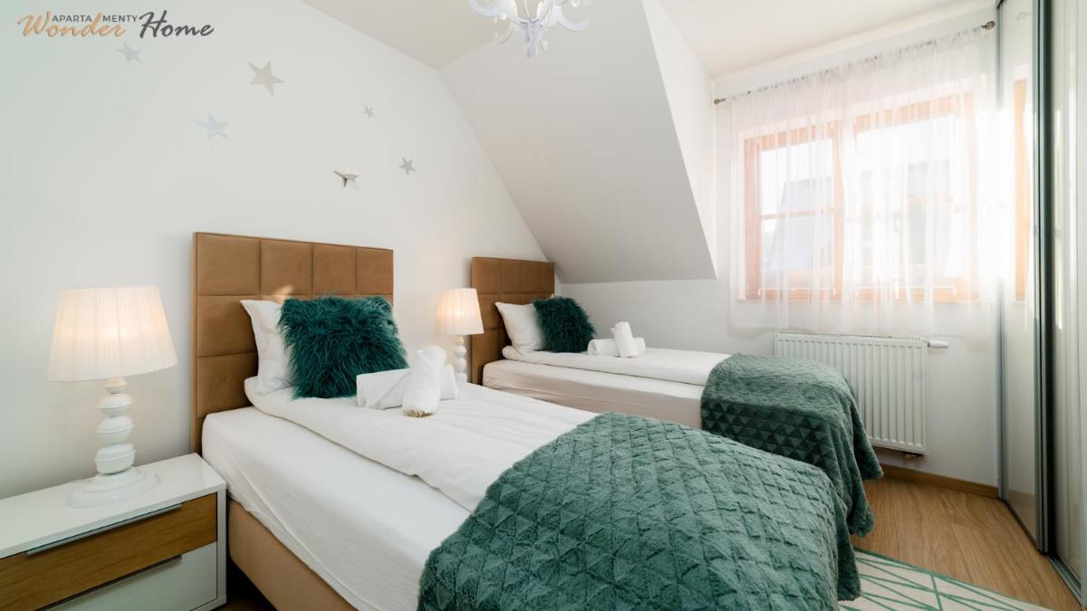 Image 7 of Wonder Home – Domki górskie z kominkami, bezpłatnym parkingiem i placem zabaw na terenie kompleksu