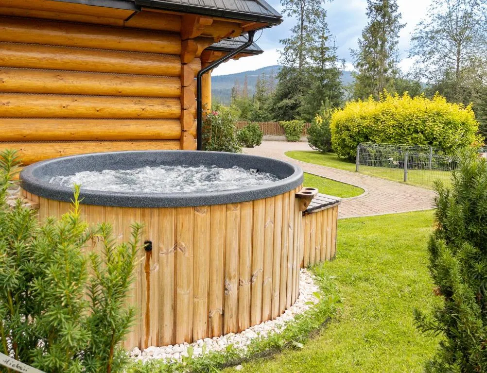 Image 1 of Mountain Base – Dwupoziomowy apartament “Przy lesie I” z prywatnym jacuzzi w Kościelisku