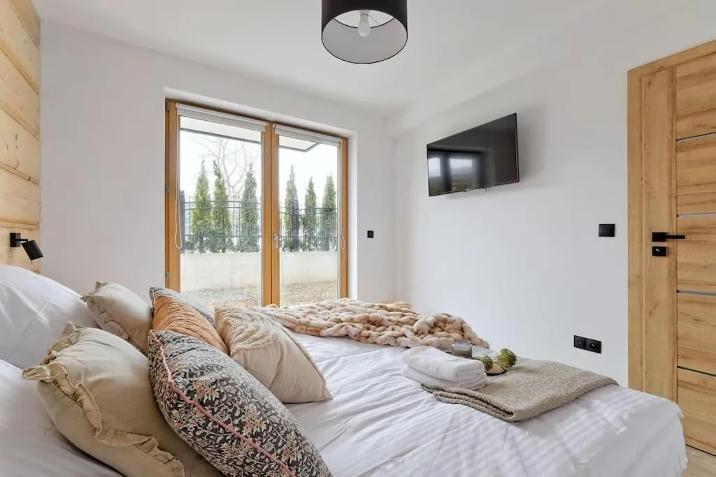 Image 2 of Two Bedroom Apartment with Terrace- Tatra View – Księżycowe Apartamenty SPA – 24i