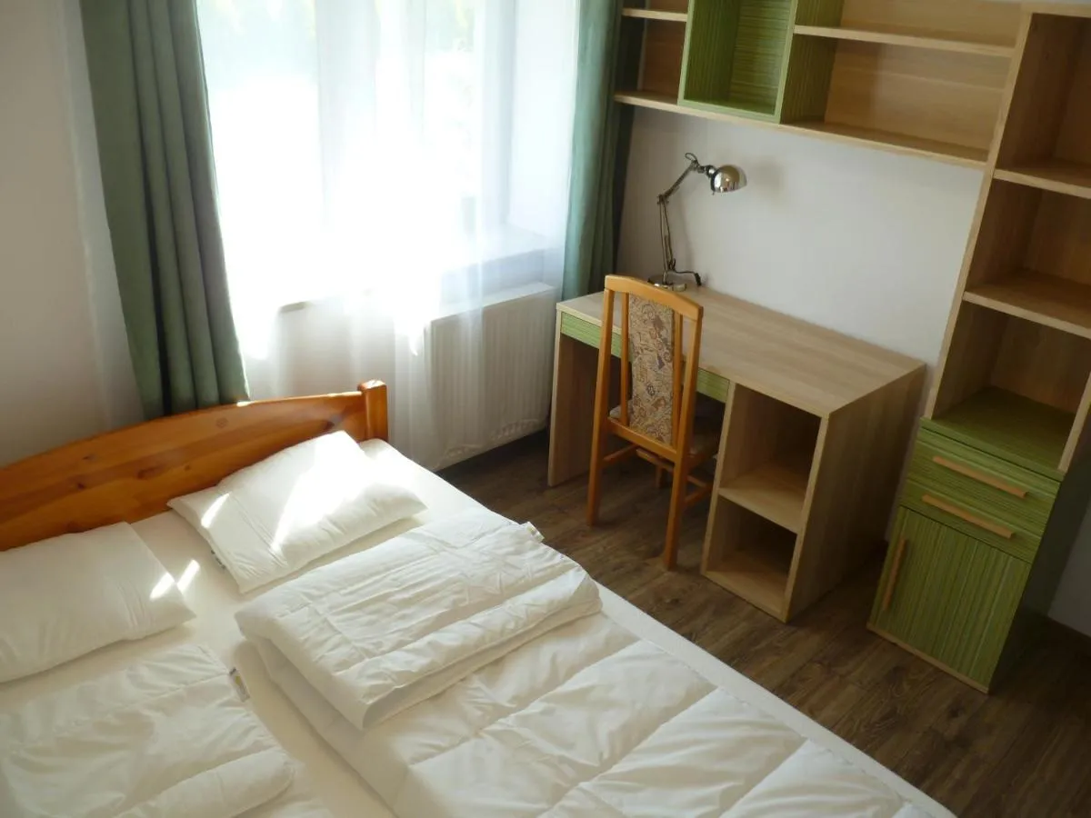 Image 2 of Klimatyczny Domek – Apartamenty & Noclegi